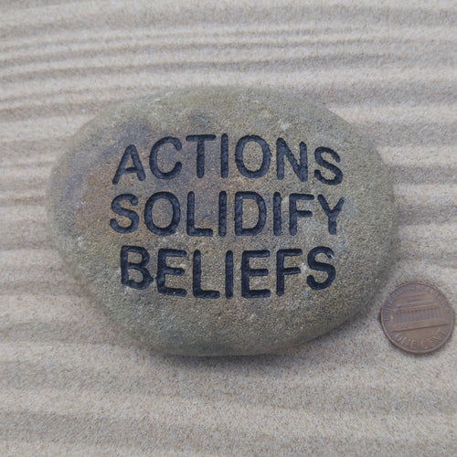 Actions Solidify Beliefs - Engraved into Skipping Stone